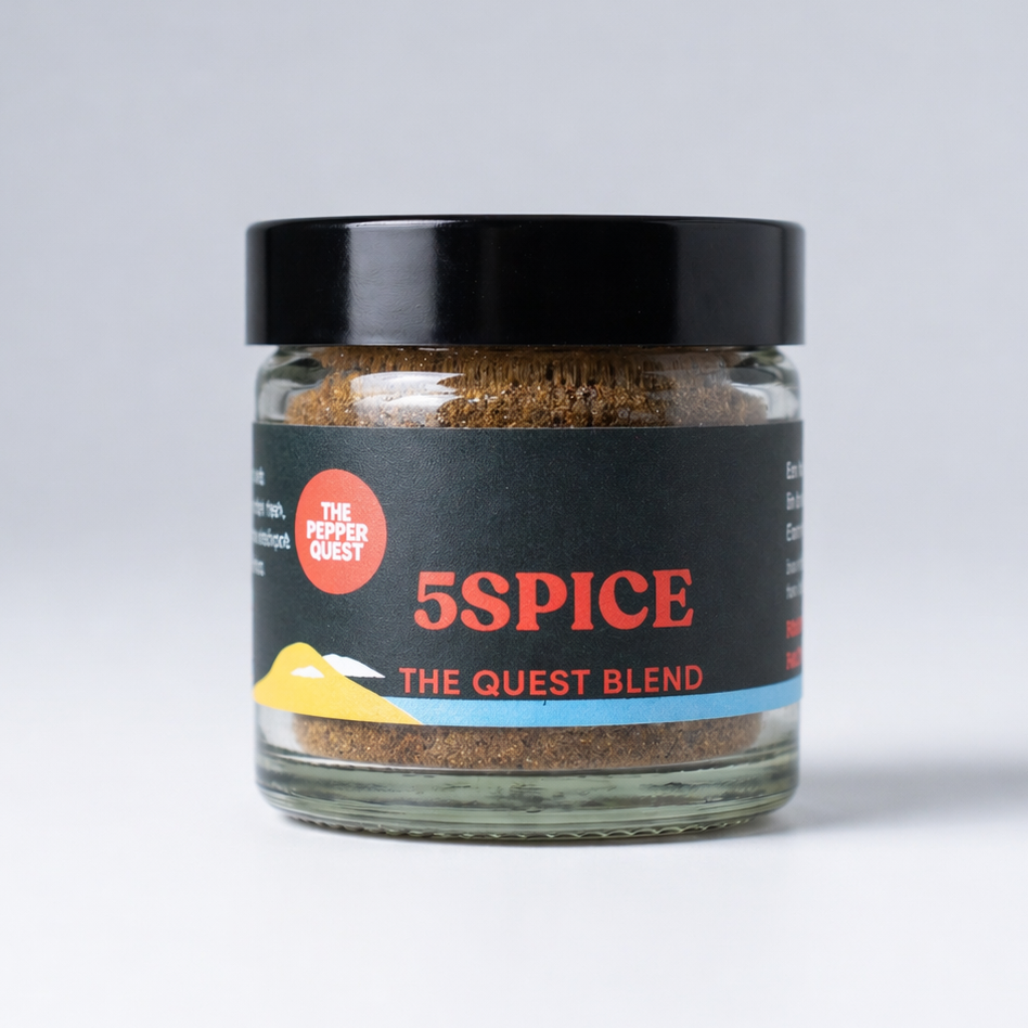 Jar of 5 Spice blend with a black lid on a white background