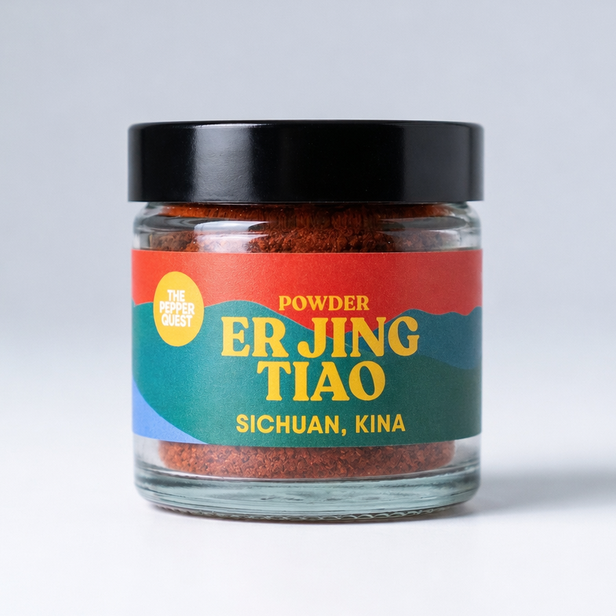 Jar of Er Jing Tiao powder with colorful label on a light gray background