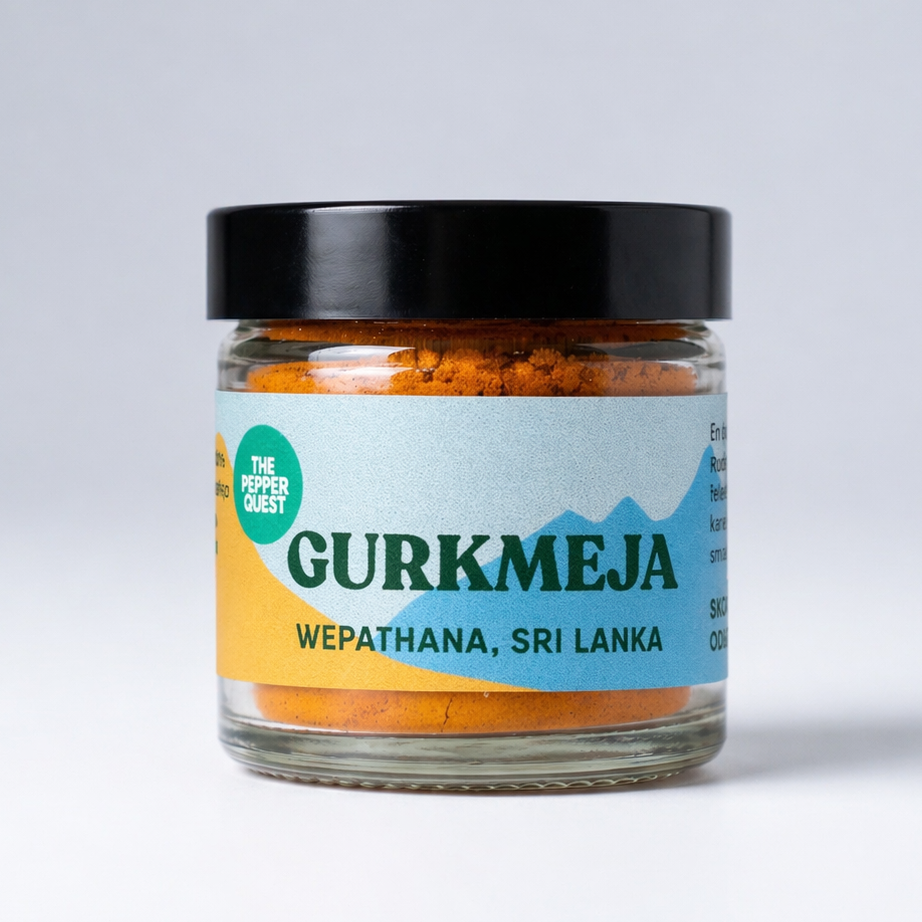 Jar of Gurkmeja spice with a colorful label on a white background