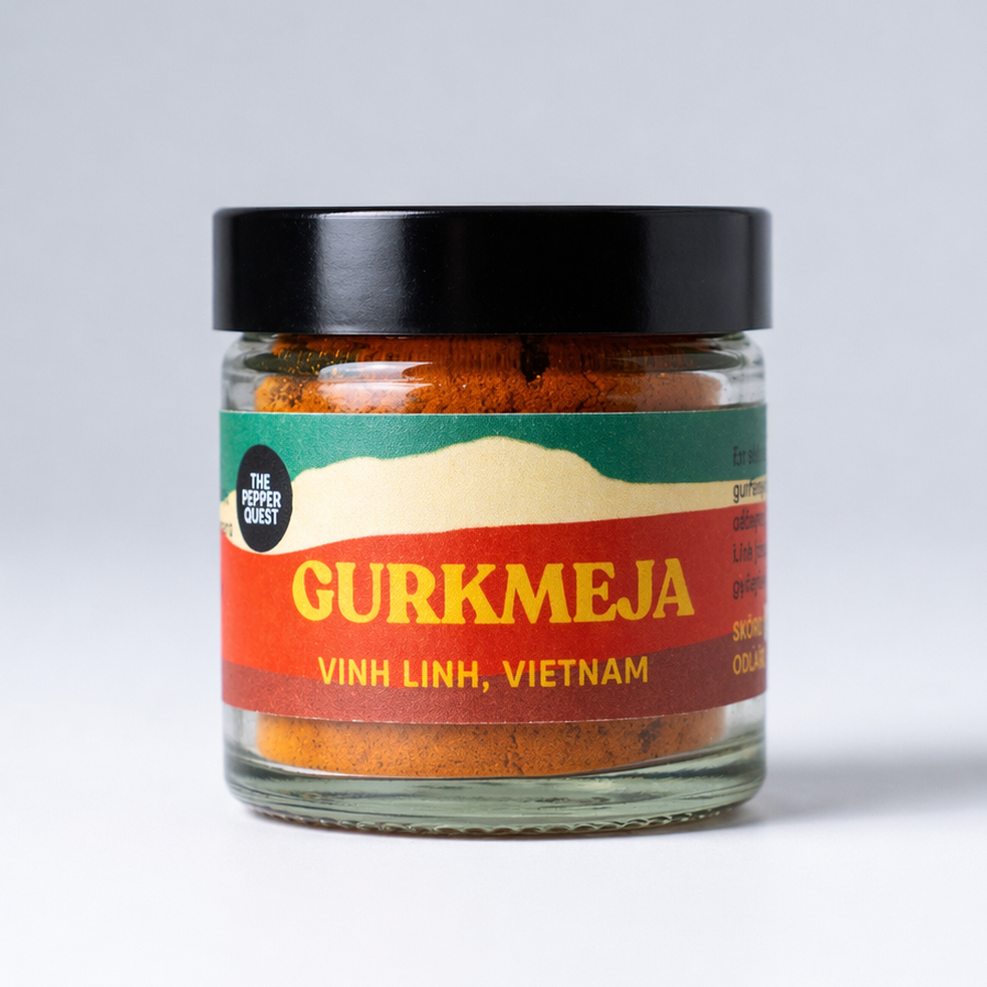 Jar of Gurkmeja with a colorful label on a white background