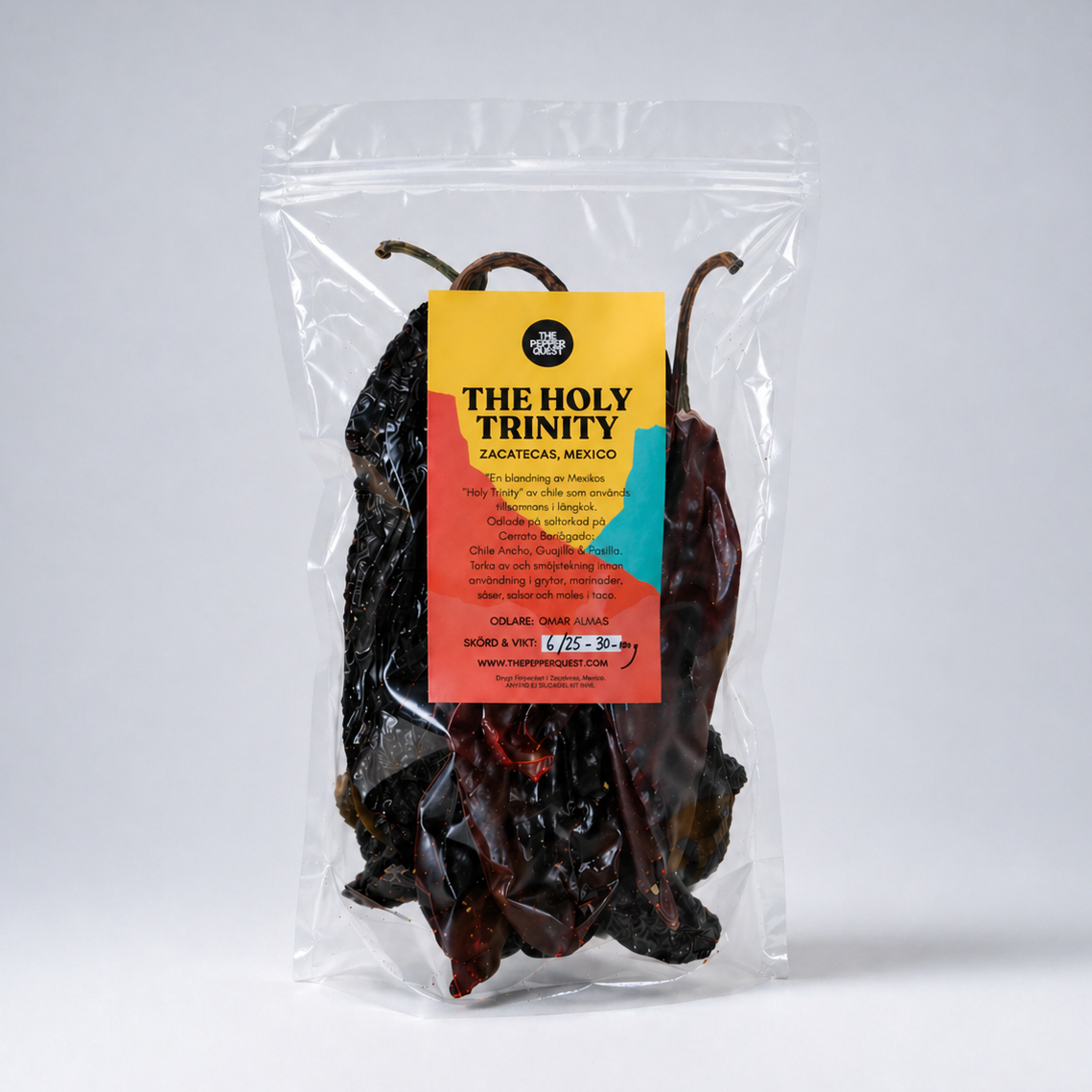 Packaged dried chilies with a colorful label on a white background