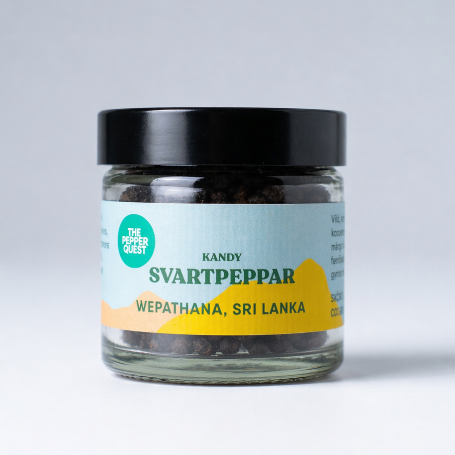 Jar of svartpeppar with a label on a light gray background