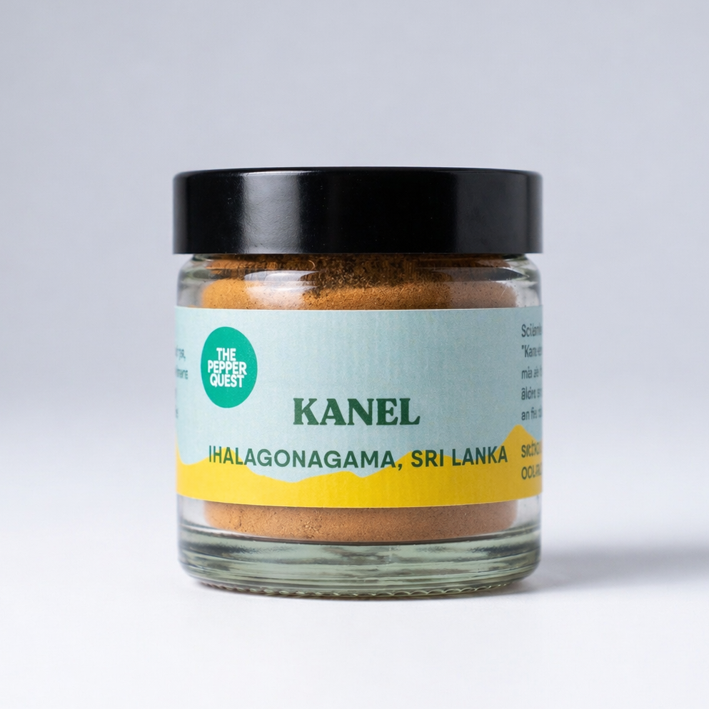 Jar of Kanel spice with a black lid on a white background