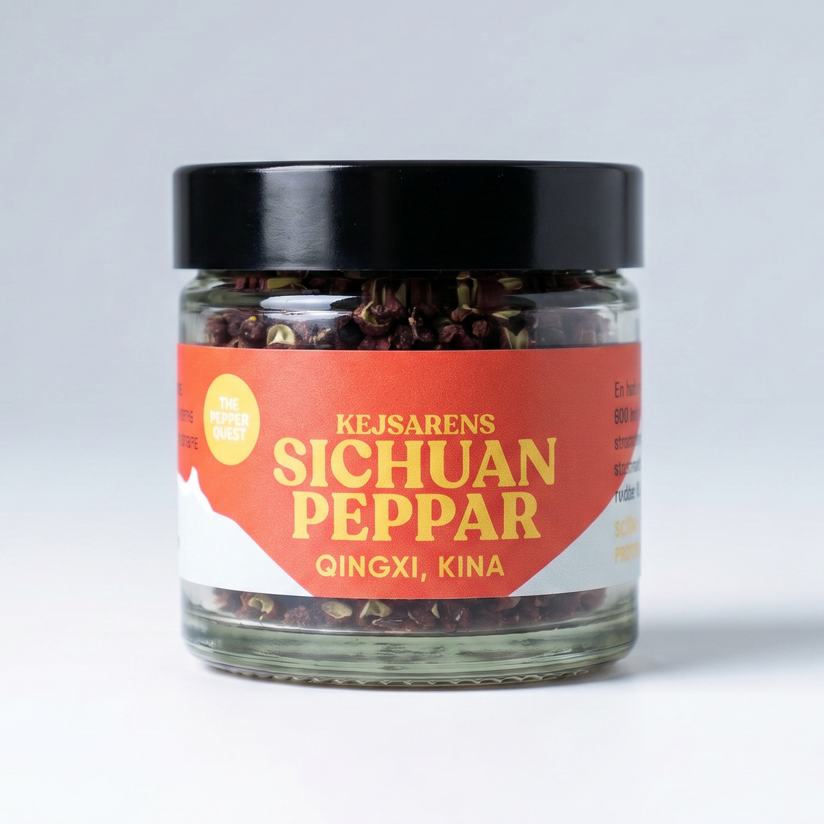 Jar of Sichuan pepper with a red label on a white background