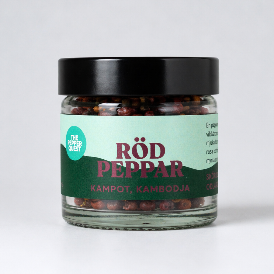 Jar of red pepper with a green label on a white background