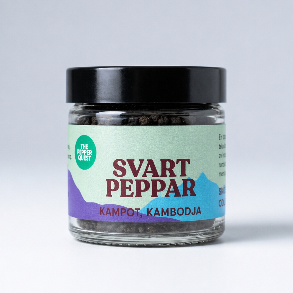 Jar of black pepper with a label on a light gray background