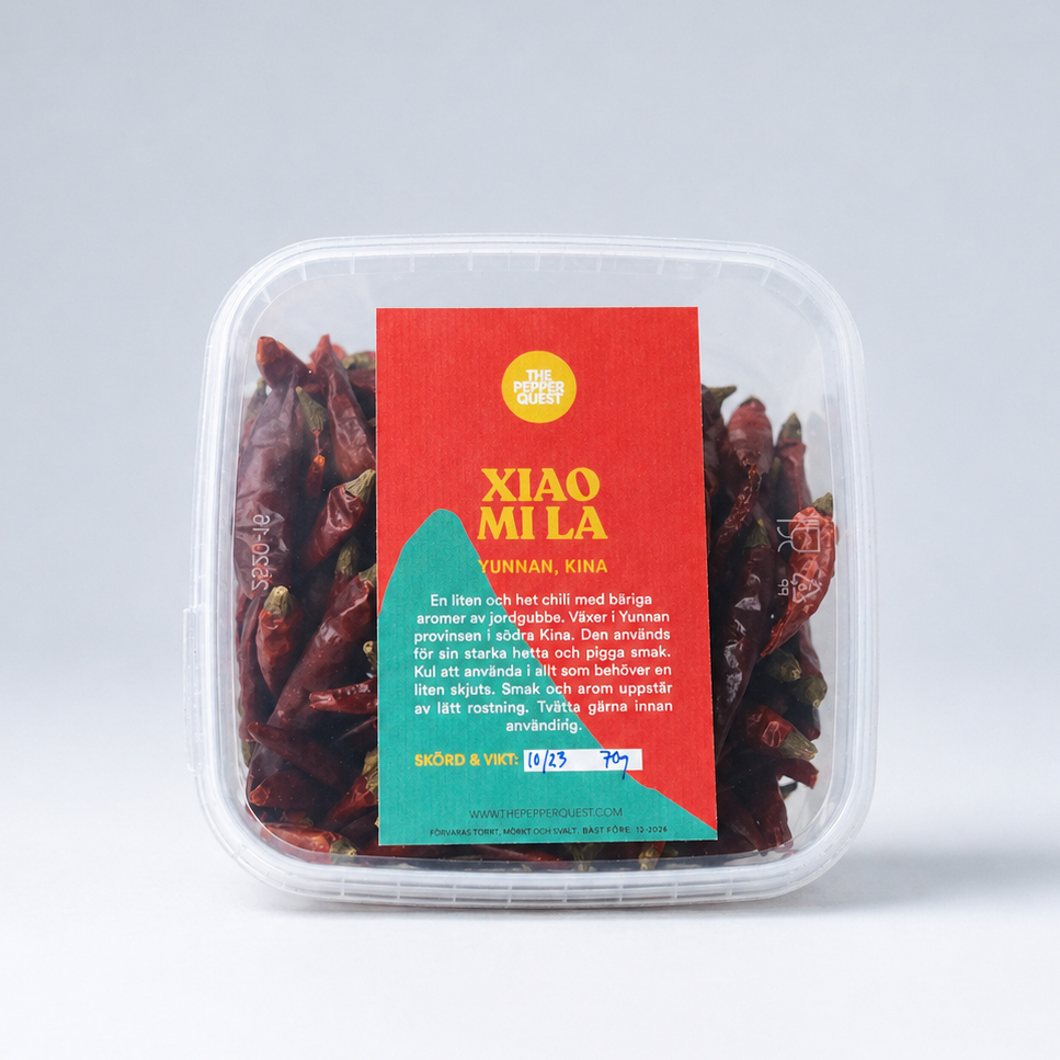 Packaged chili with a colorful label on a light gray background
