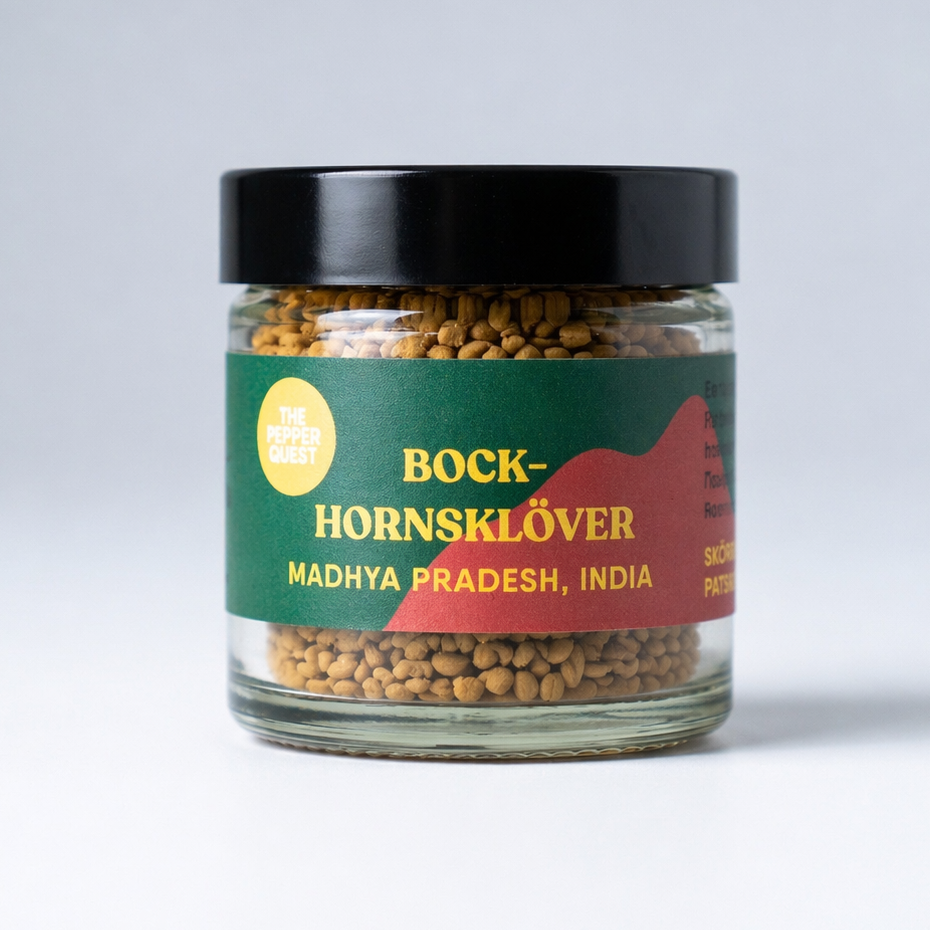 Jar of Fenugreek with a green label on a white background