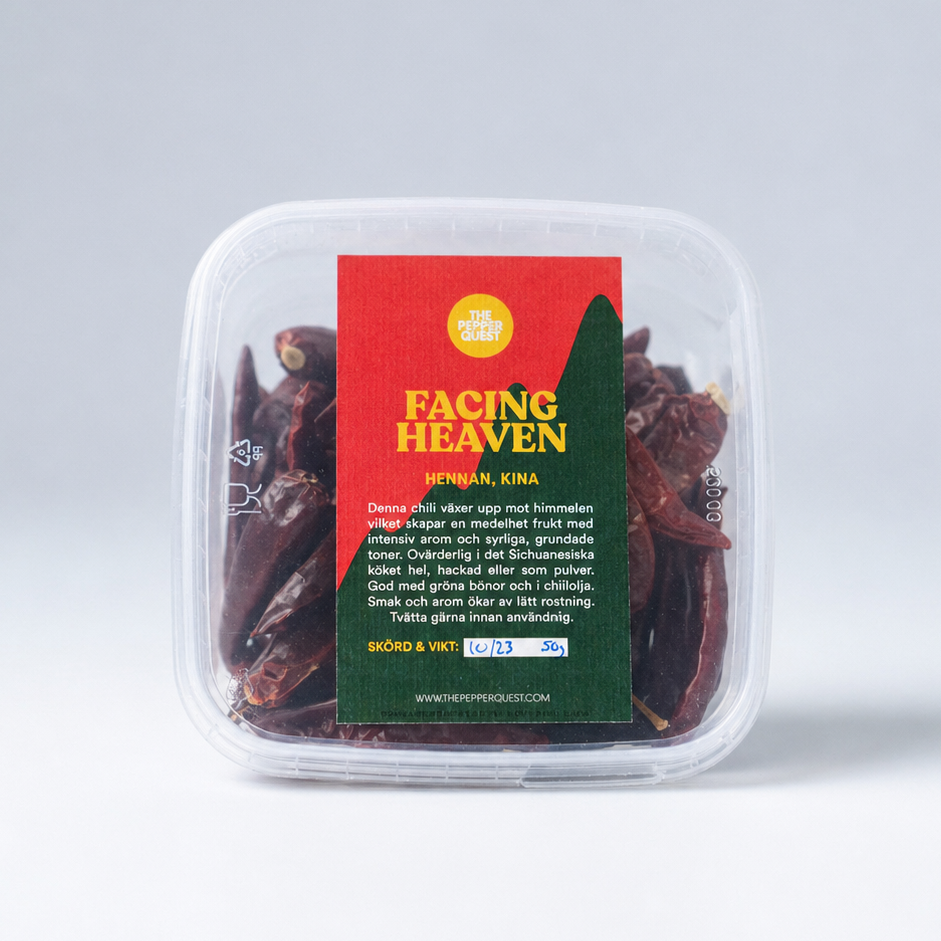 Packaged product with a 'Facing Heaven' label on a gray background