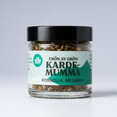 Jar of 'Karde-Mumma' spice with a black lid on a white background