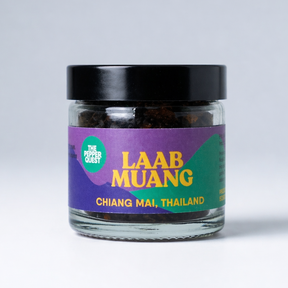 Jar of Laab Muang from Chiang Mai, Thailand on a light gray background