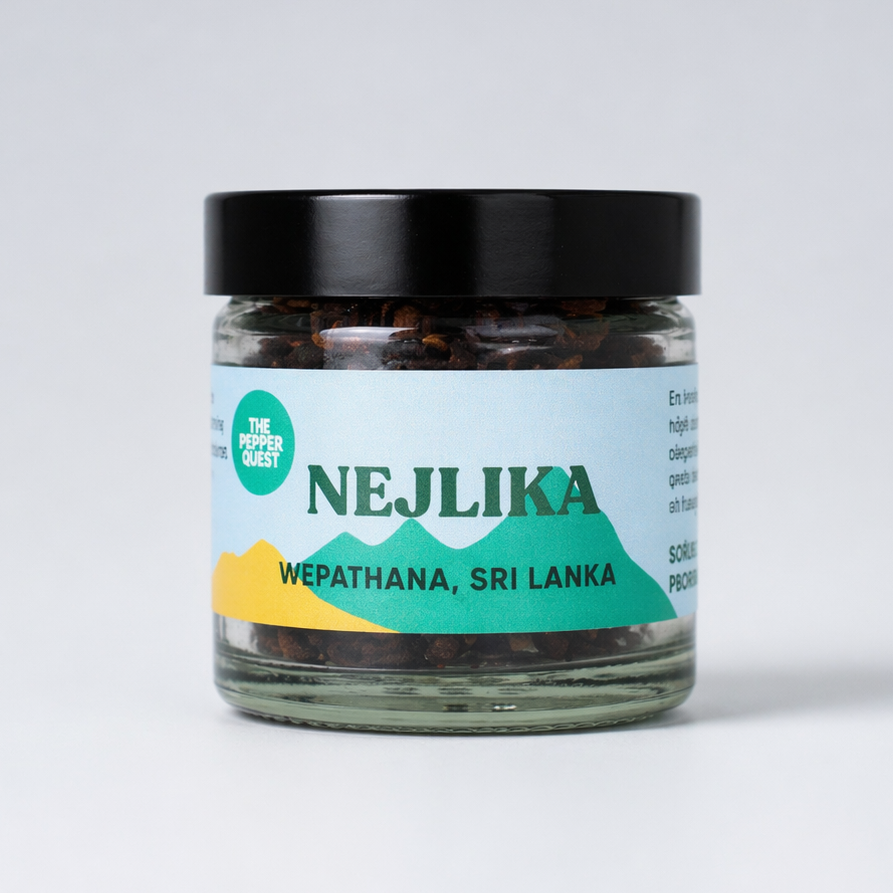 Jar of NEJLIKA cloves with a mountain design on the label against a white background