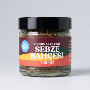Jar of 'Sebze Bahcesi' spice blend with colorful label on a white background