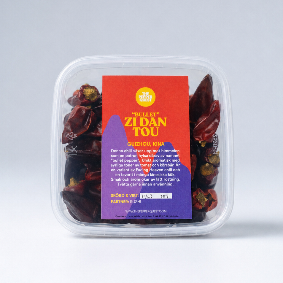 Packaged chili with a colorful label on a white background